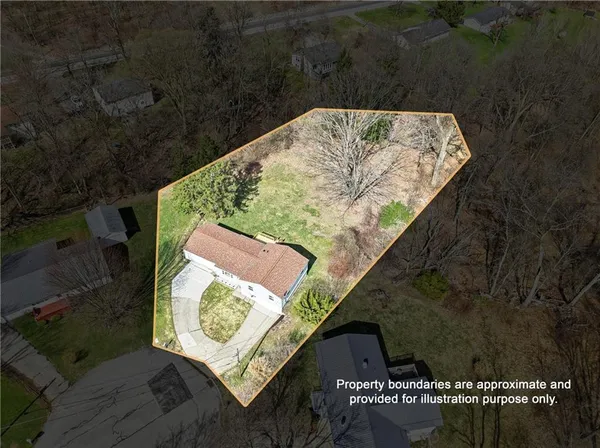 a view of a room with wooden walls