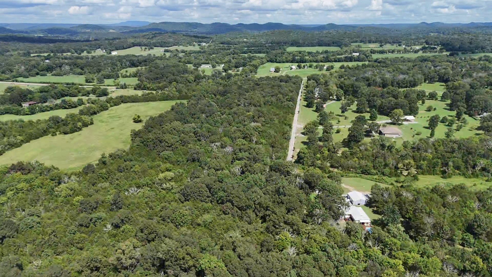 0 Murray-Kittrell Road Readyville, TN 37149 - Photo 10 of 25 an aerial view of a houses with a lush green hillside