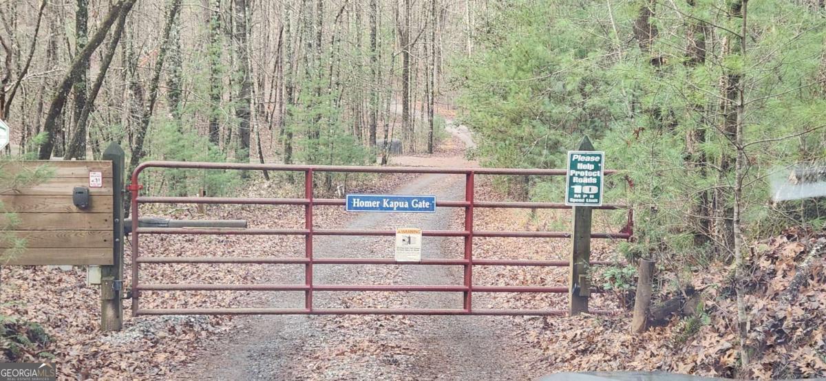 3-lots Ridgecrest Drive, Unit 76 78 80 Blue Ridge, GA 30513 - Photo 16 of 17 a view of outdoor space with wooden fence