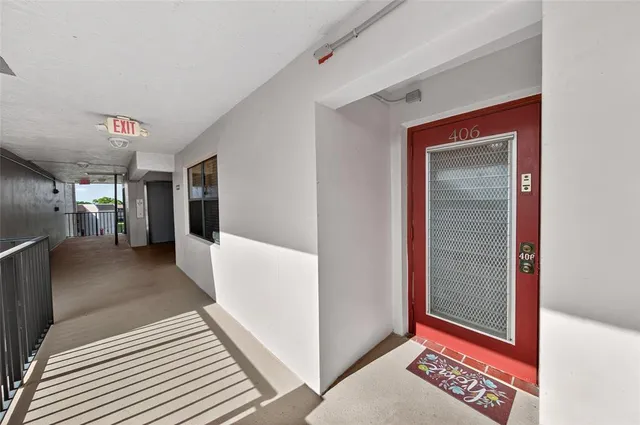 a view of a hallway with closet