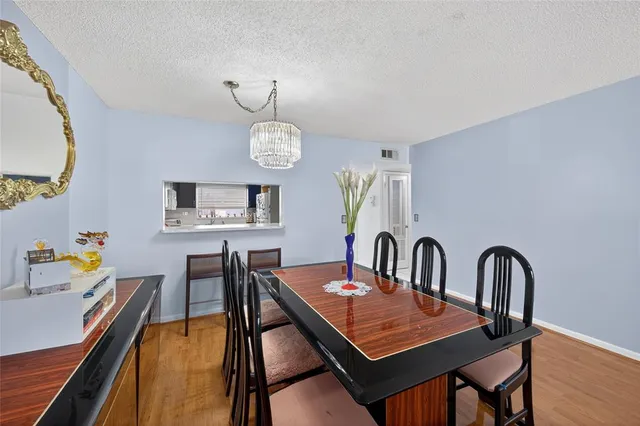 a view of a dining room with furniture