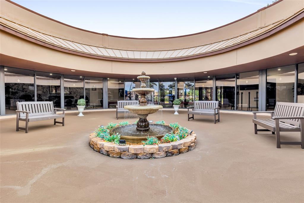 10145 Sunrise Lakes Boulevard, Unit 406 Sunrise, FL 33322 - Photo 36 of 37 a living room with furniture and a potted plant