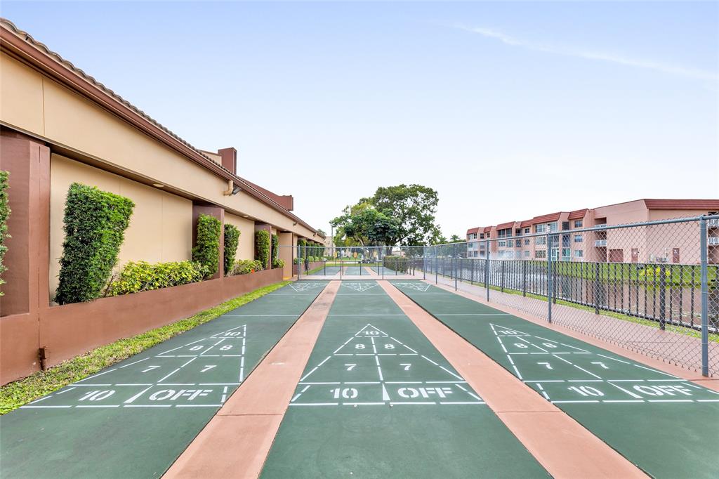 10145 Sunrise Lakes Boulevard, Unit 406 Sunrise, FL 33322 - Photo 37 of 37 a view of house with a yard