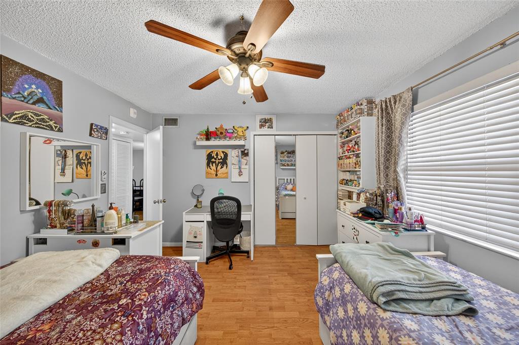 10145 Sunrise Lakes Boulevard, Unit 406 Sunrise, FL 33322 - Photo 10 of 37 a living room with furniture and a large window