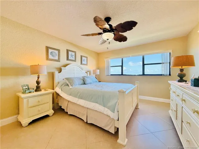 a bathroom with a sink vanity and a mirror