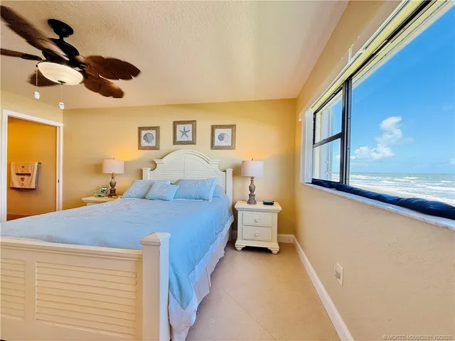 a bathroom with a shower and a glass door shower