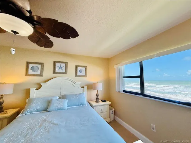 a bathroom with a toilet sink and shower