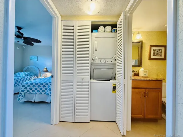 a view of a livingroom with furniture and a window