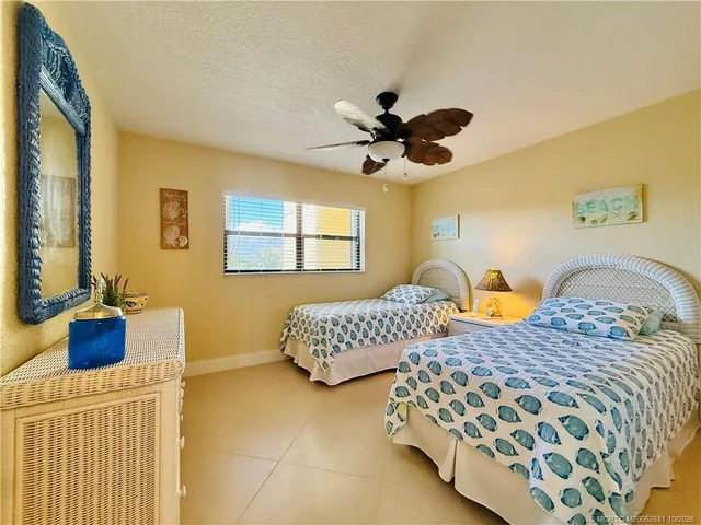 a view of a swimming pool with a lounge chairs