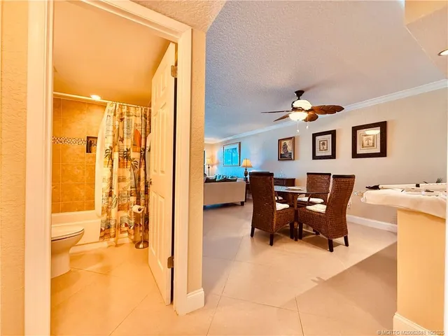 a hallway with a book shelf and a book shelf