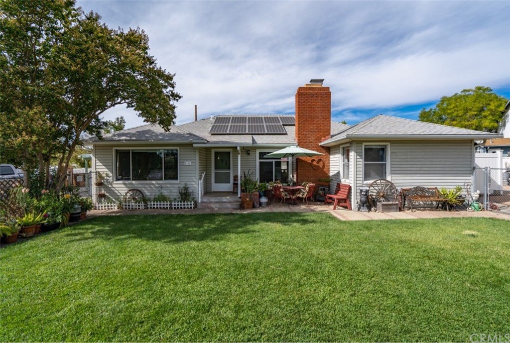 Great curb appeal with nice front yard, newer roof, and owned solar system!