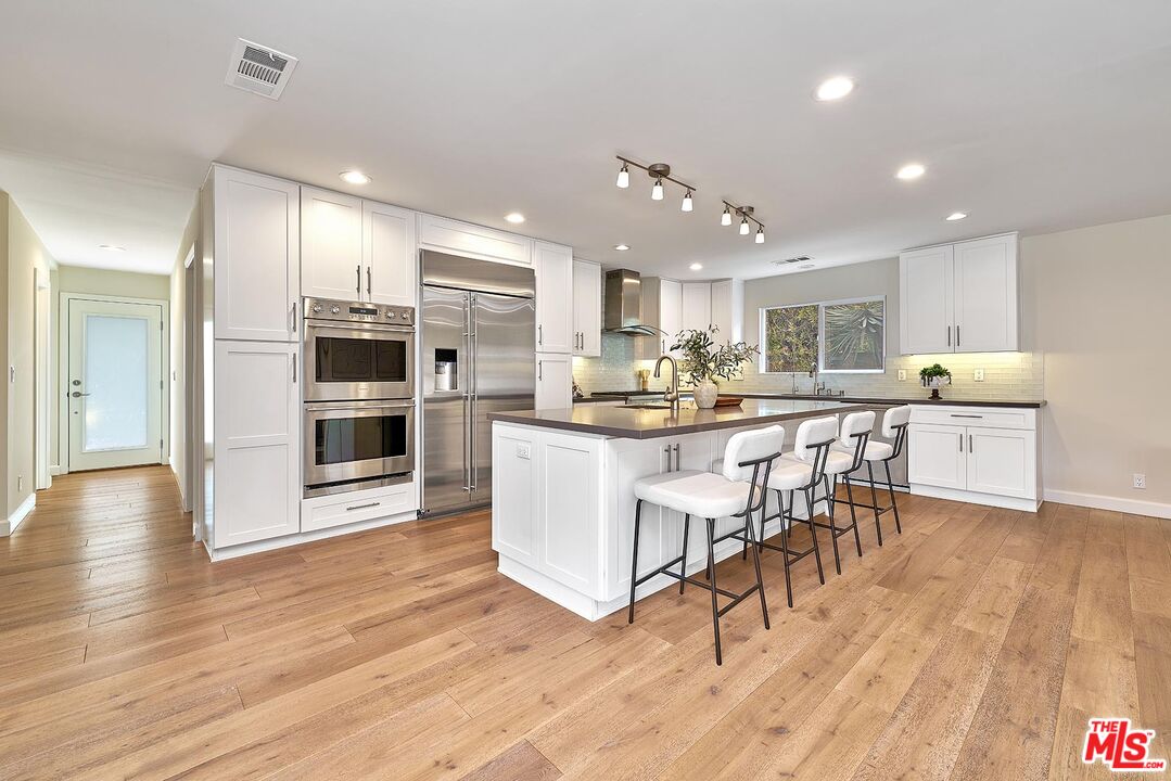 12041 Weatherby Road Los Alamitos, CA 90720 - Photo 8 of 32