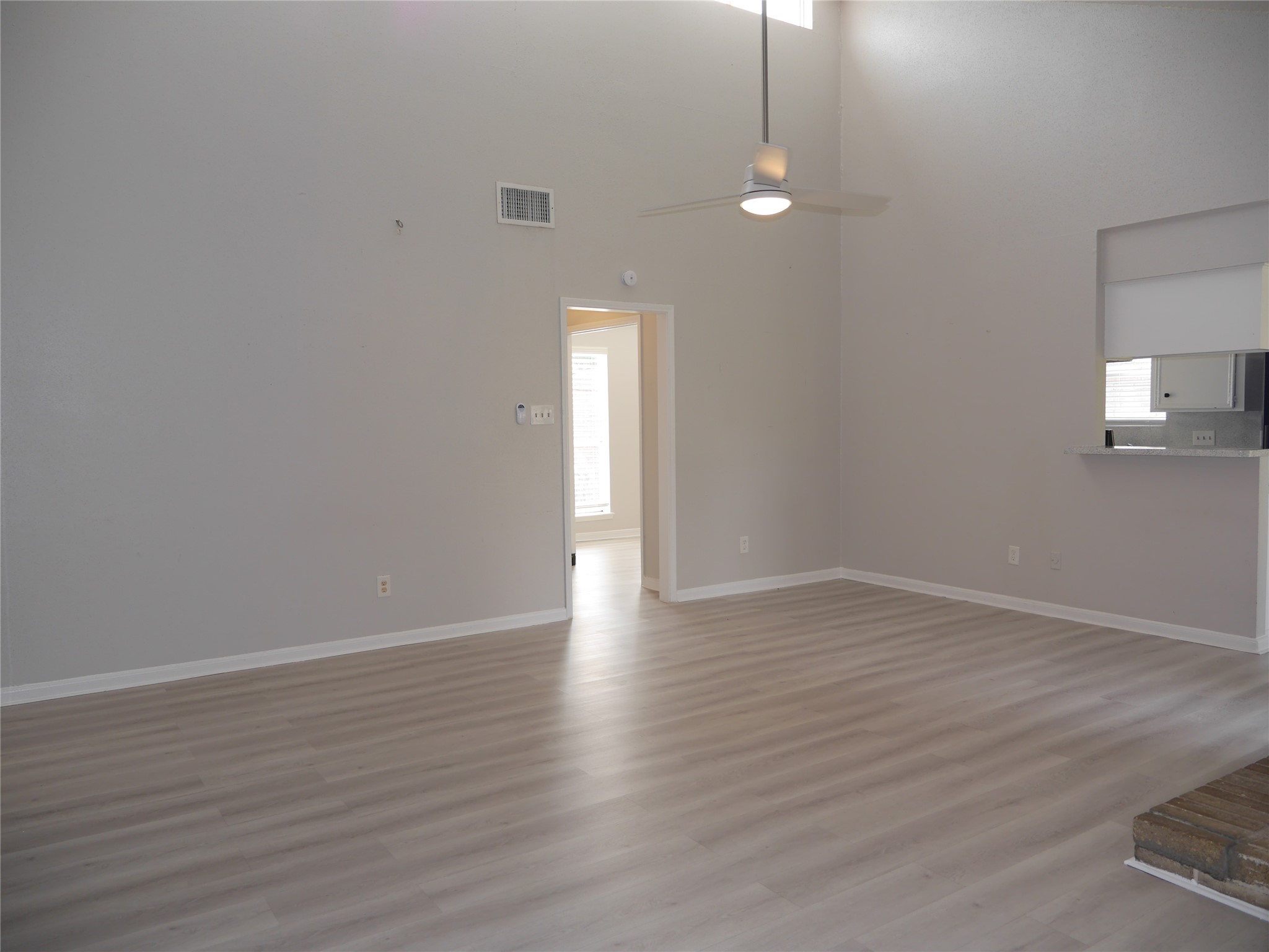 7410 Canasta Lane Houston, TX 77083 - Photo 15 of 33 a view of an empty room with wooden floor and a window