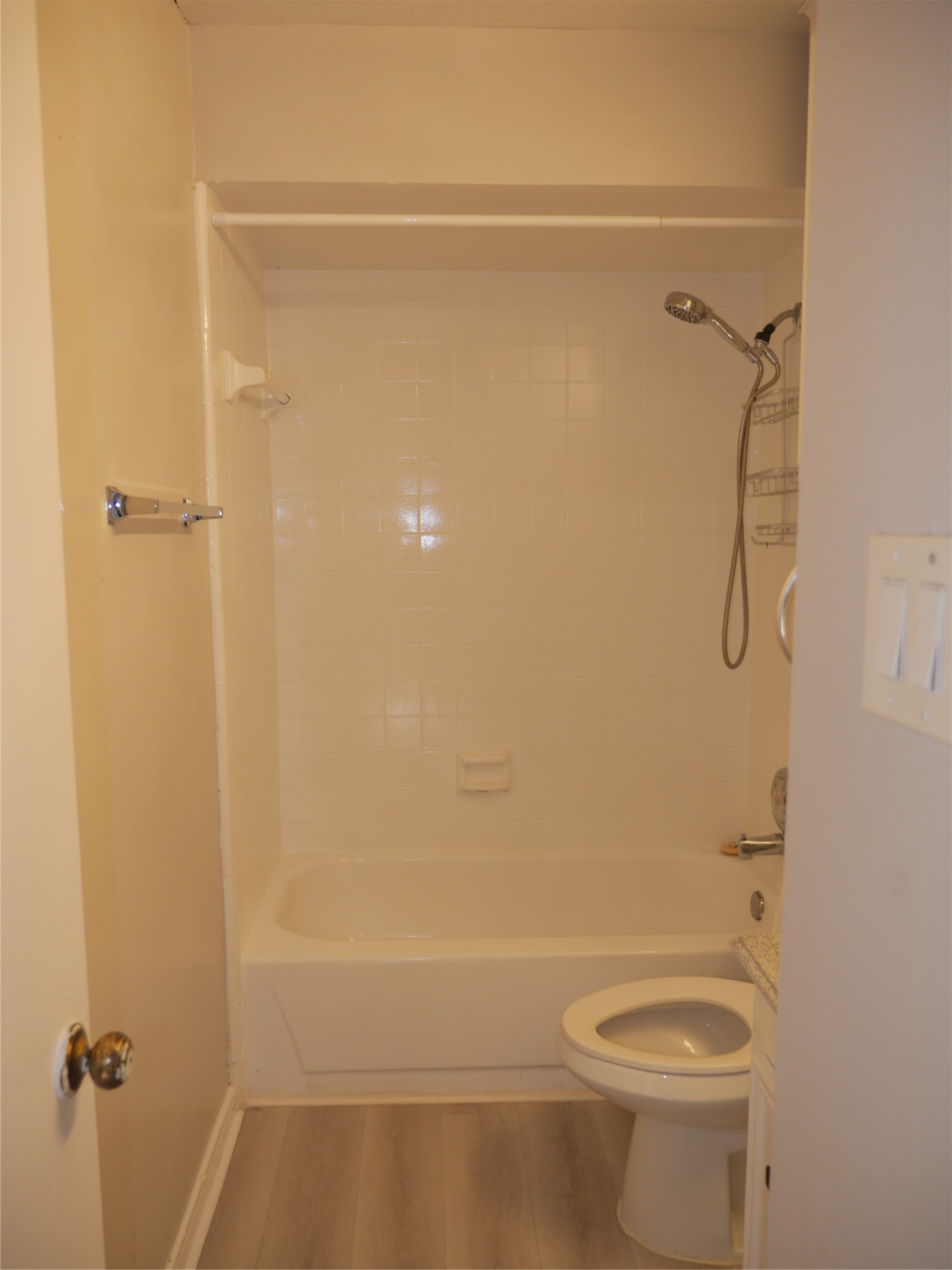7410 Canasta Lane Houston, TX 77083 - Photo 21 of 33 a bathroom with a granite countertop sink toilet and shower
