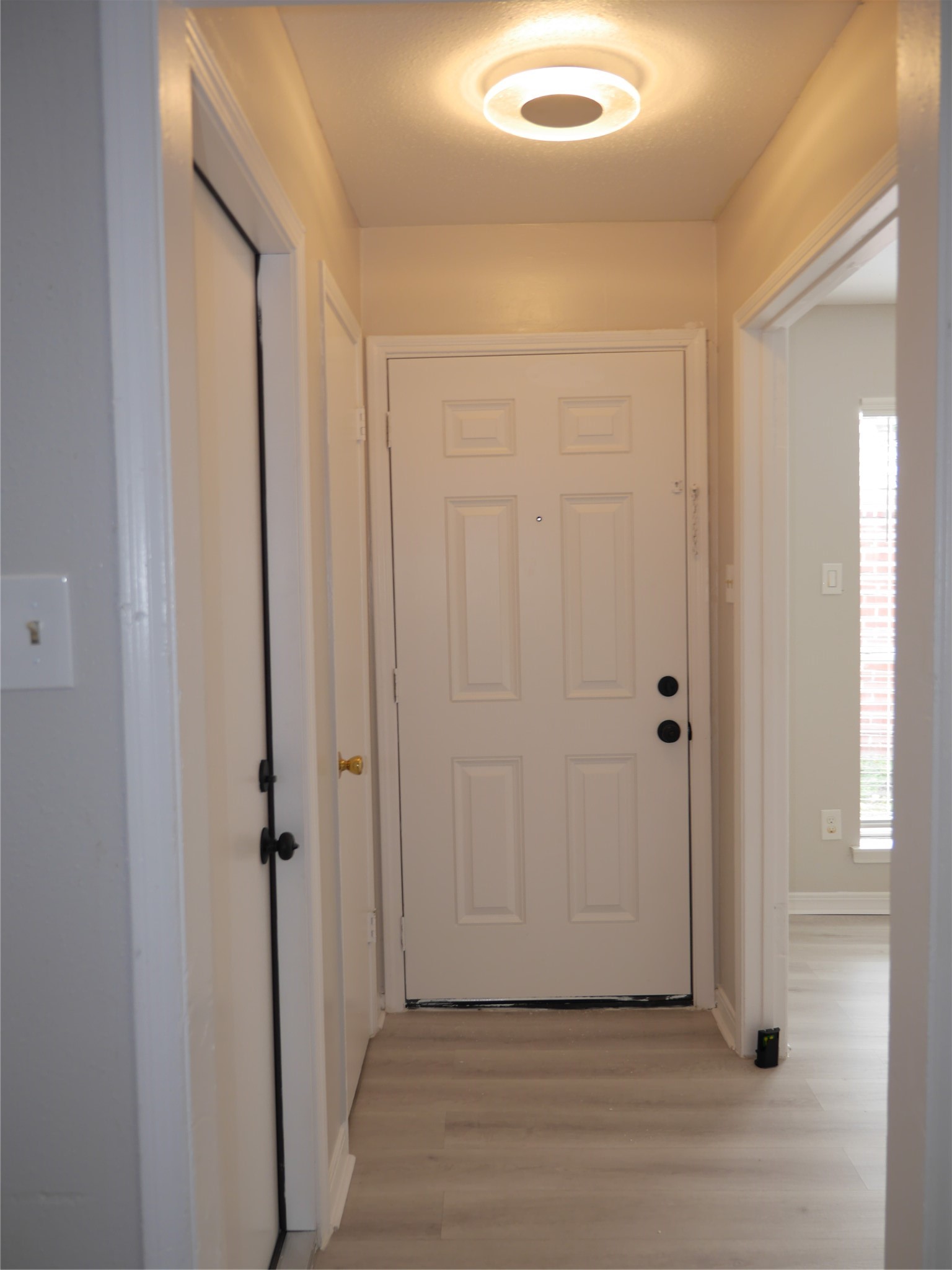7410 Canasta Lane Houston, TX 77083 - Photo 4 of 33 a view of a hallway with wooden floor