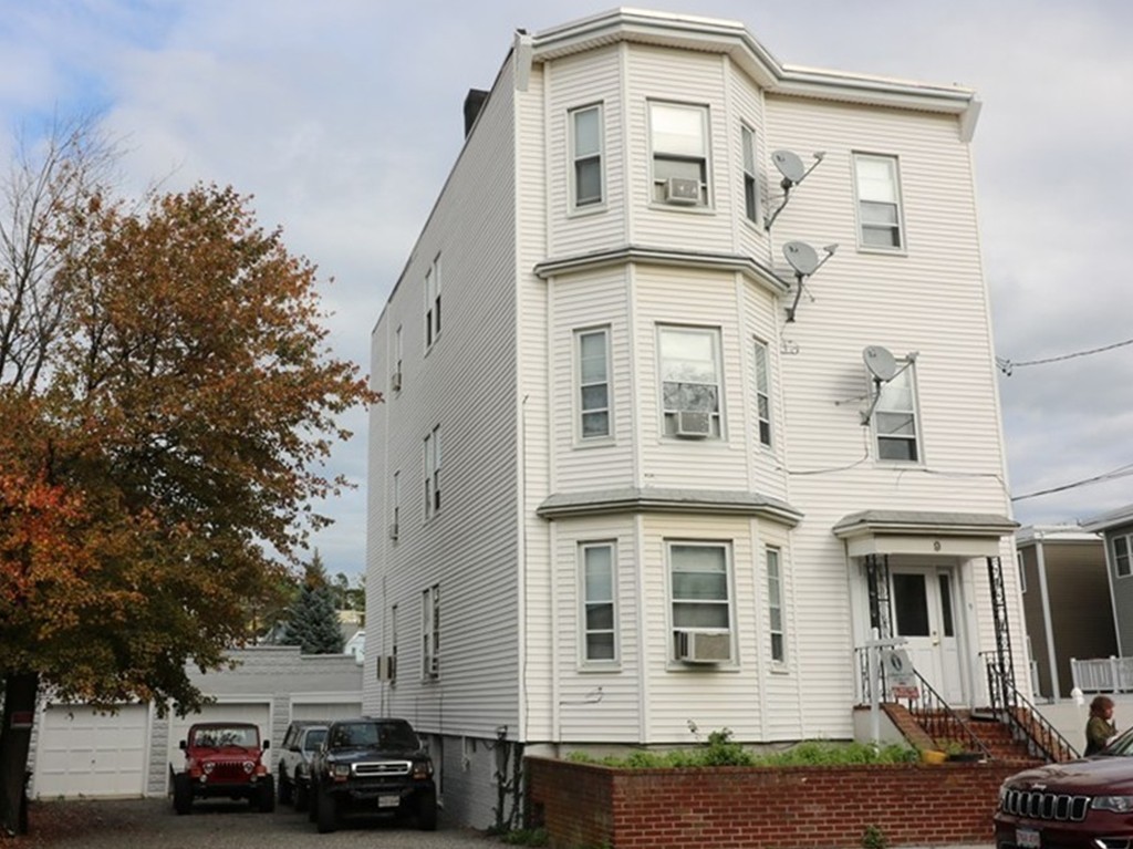 a car parked in front of a building
