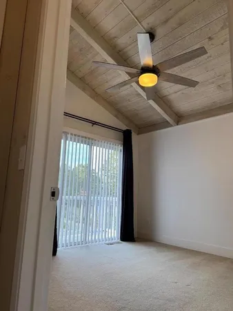 a view of a room with a window