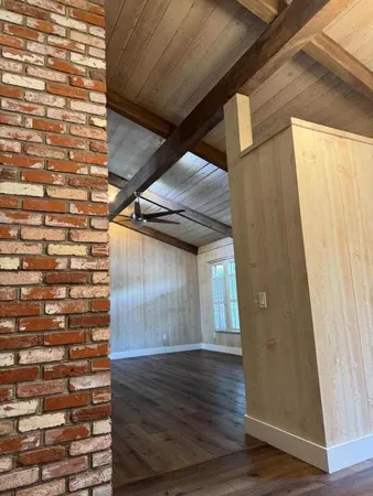 a view of entryway with wooden floor