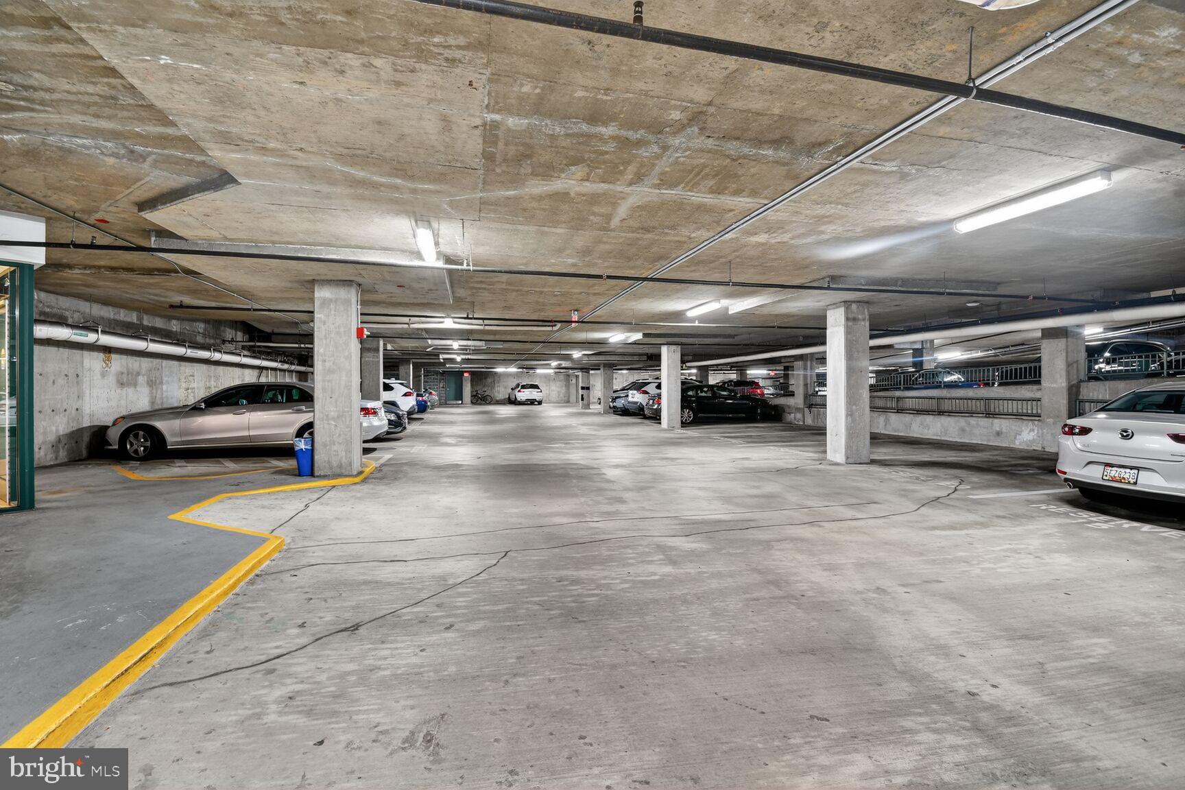 11700 Old Georgetown Road, Unit 714 Rockville, MD 20852 - Photo 18 of 21 a view of parking garage with cars