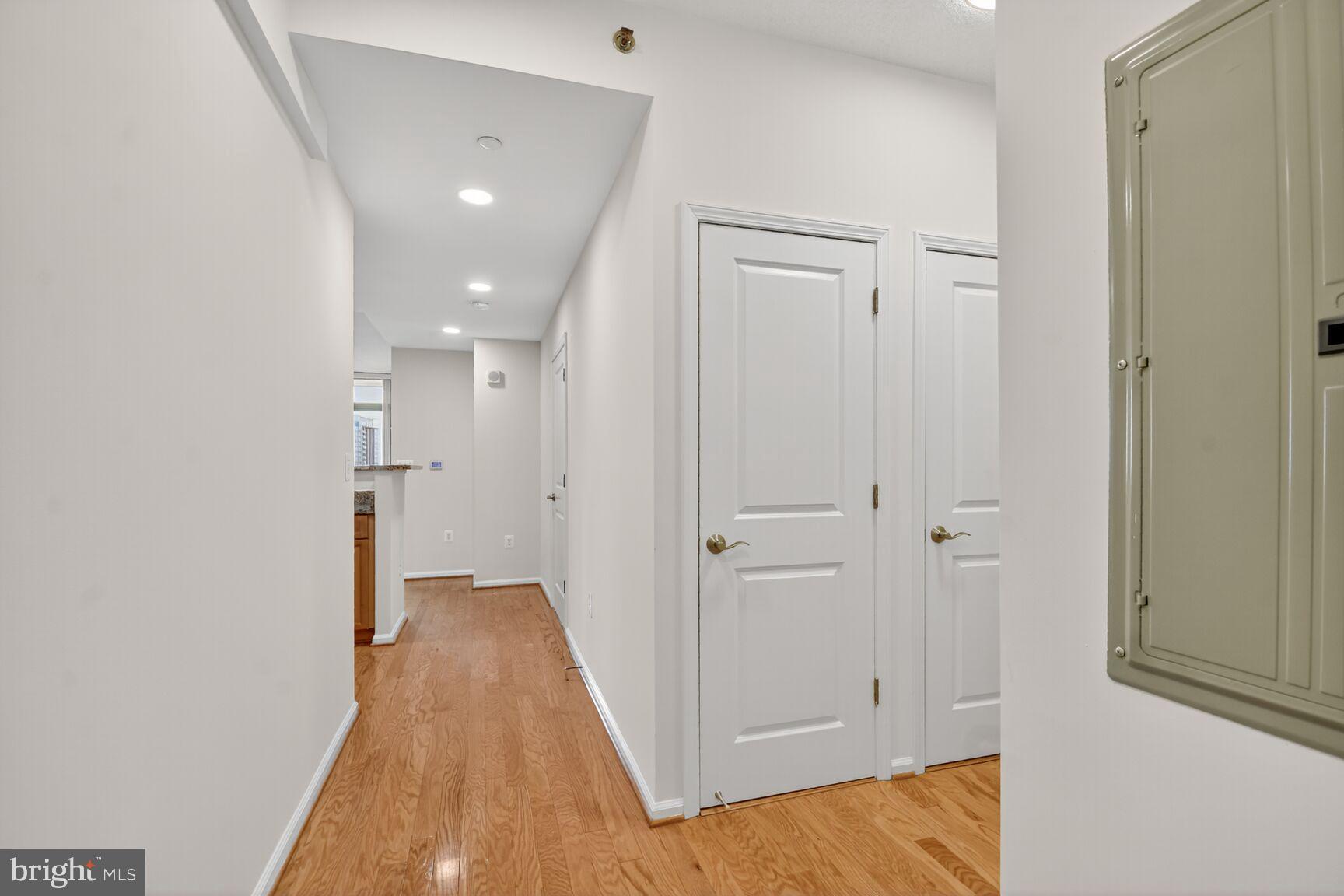 11700 Old Georgetown Road, Unit 714 Rockville, MD 20852 - Photo 2 of 21 a view of a room with wooden floor and closet