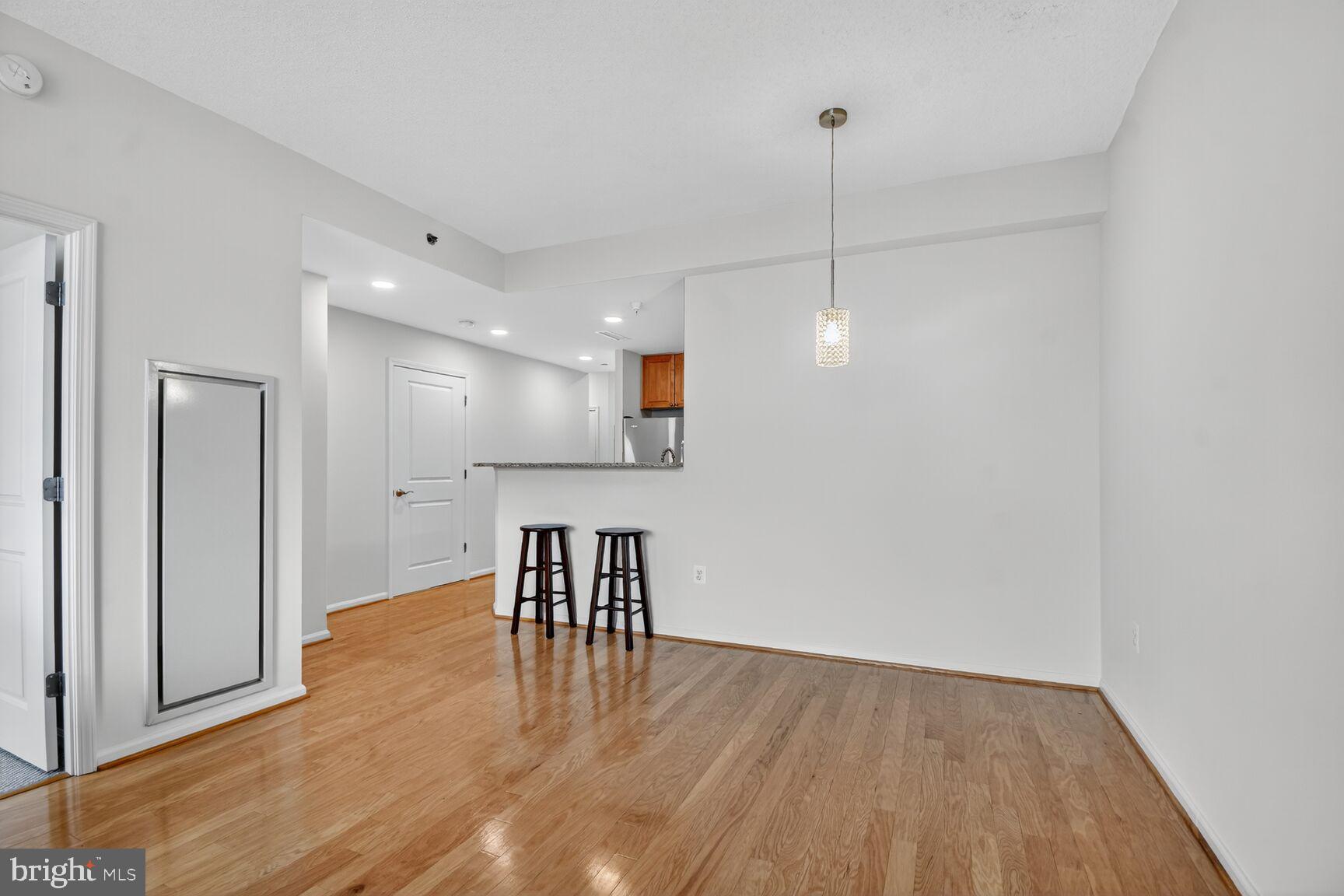 11700 Old Georgetown Road, Unit 714 Rockville, MD 20852 - Photo 9 of 21 a view of a kitchen and dining room