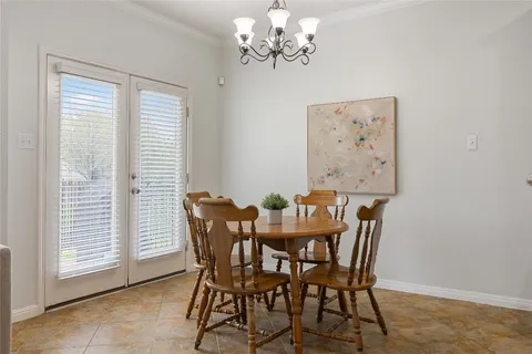 a kitchen with stainless steel appliances granite countertop a refrigerator sink and stove