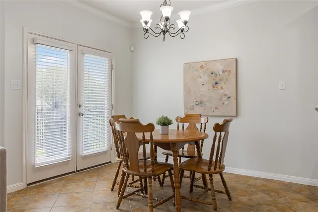 a kitchen with stainless steel appliances granite countertop a refrigerator sink and stove