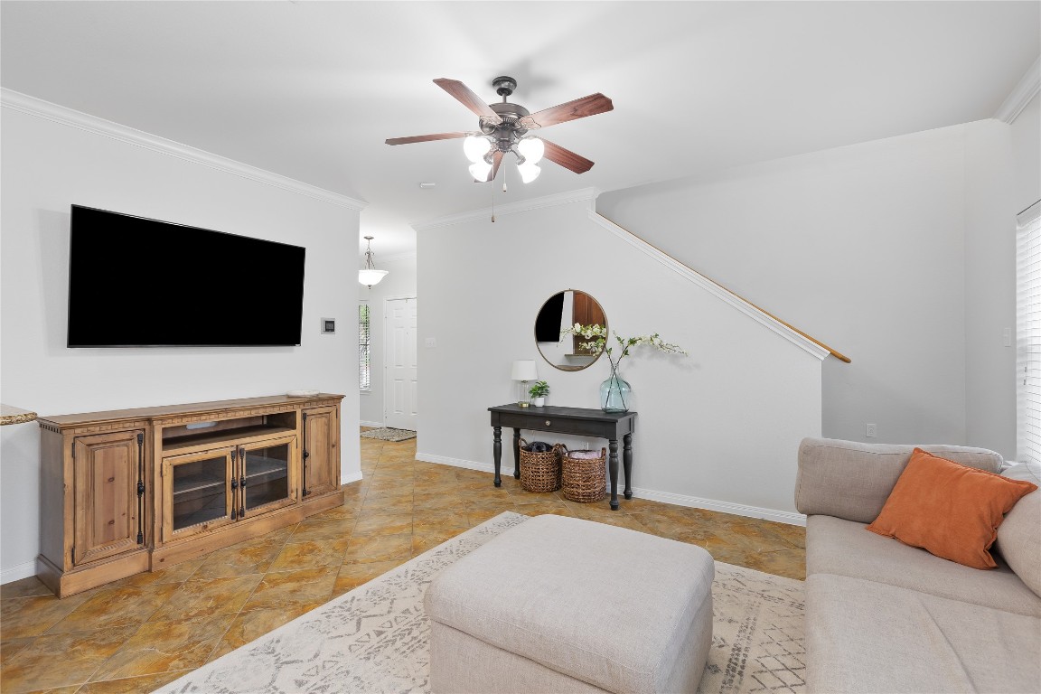 11237 Lost Maples Trail Austin, TX 78748 - Photo 1 of 35 a living room with furniture and a flat screen tv
