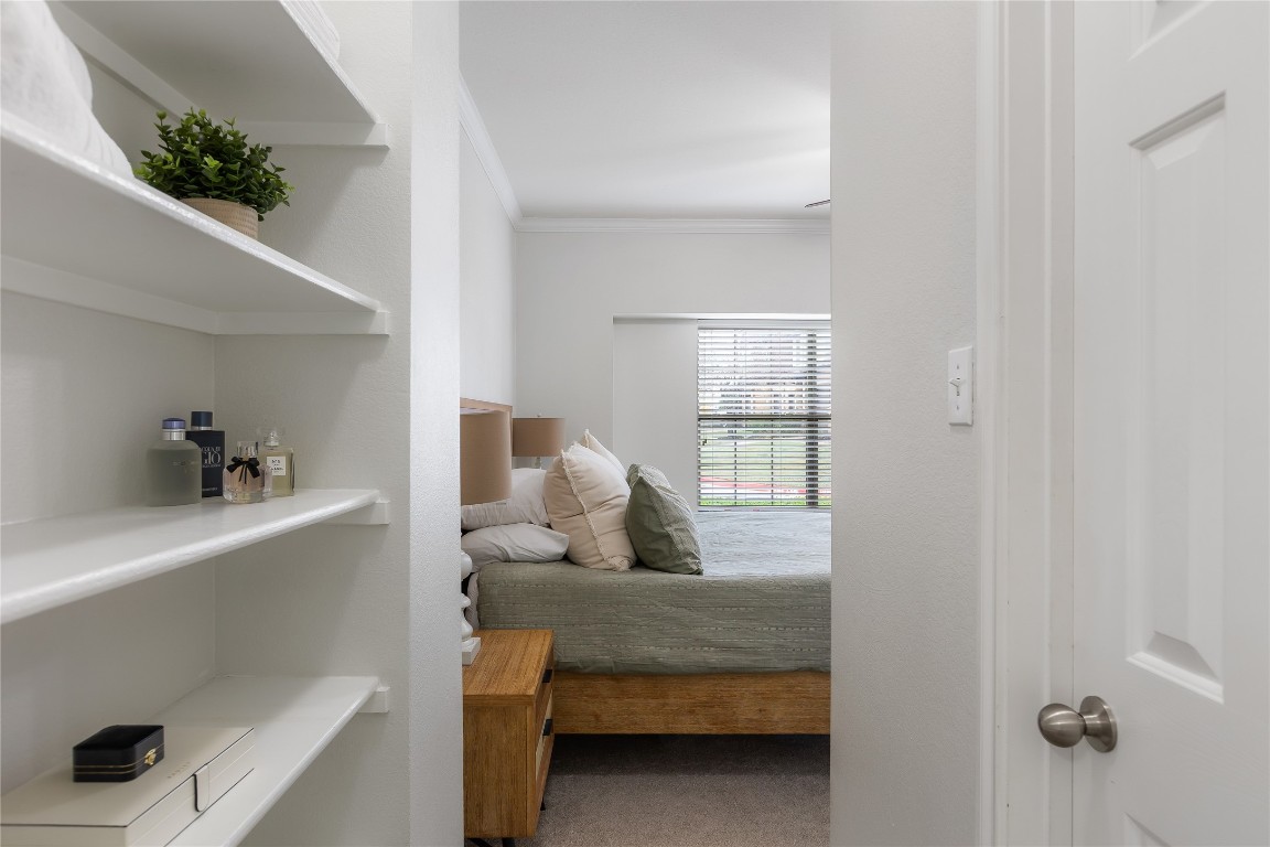 11237 Lost Maples Trail Austin, TX 78748 - Photo 19 of 35 a bedroom with a bed and a window