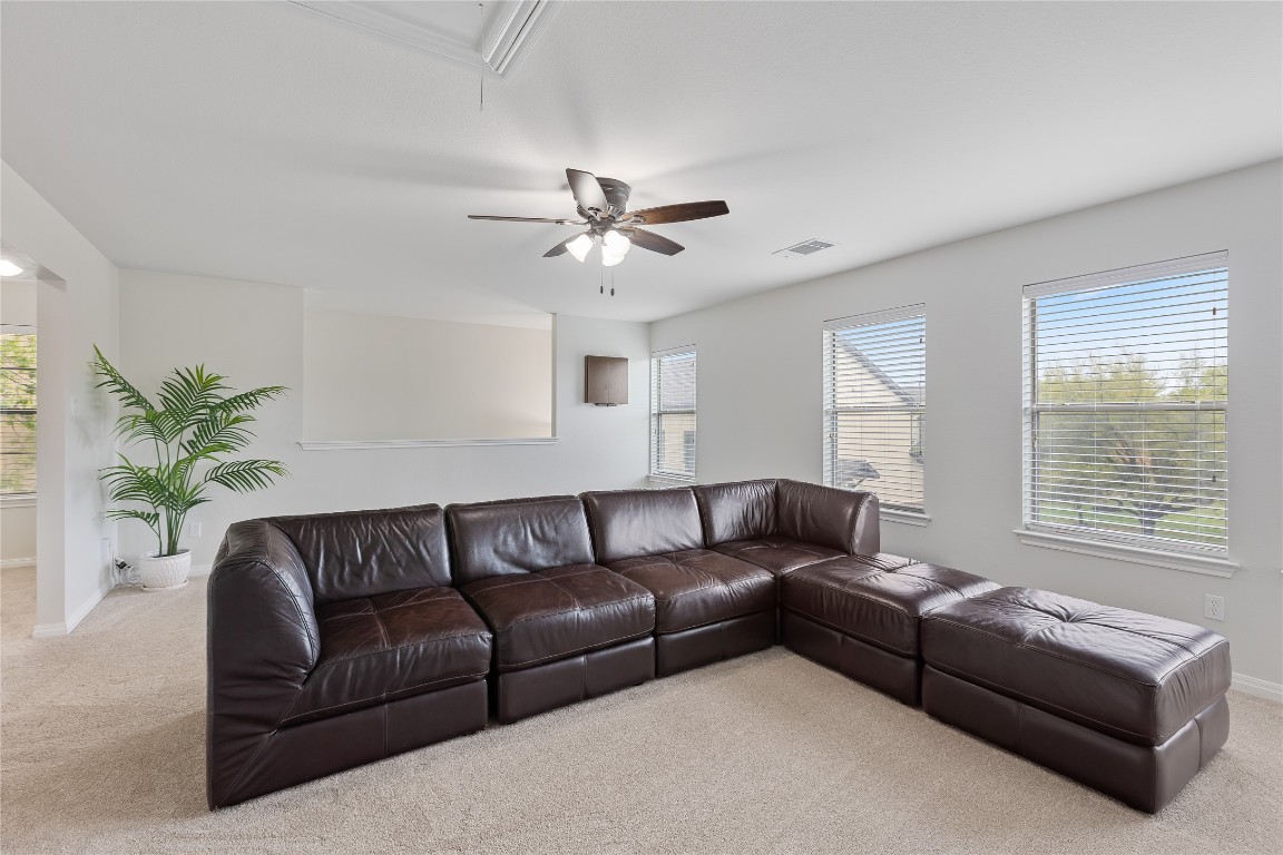 11237 Lost Maples Trail Austin, TX 78748 - Photo 25 of 35 a living room with furniture and a window