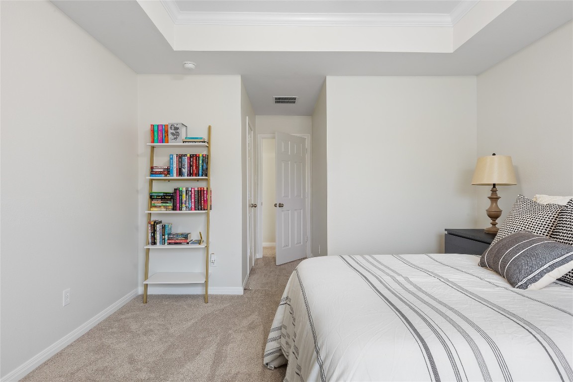 11237 Lost Maples Trail Austin, TX 78748 - Photo 28 of 35 a bedroom with a bed and closet