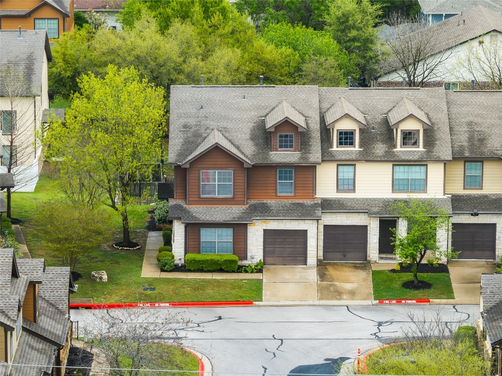 11237 Lost Maples Trail Austin, TX 78748 - Photo 32 of 35 a front view of a house with a yard
