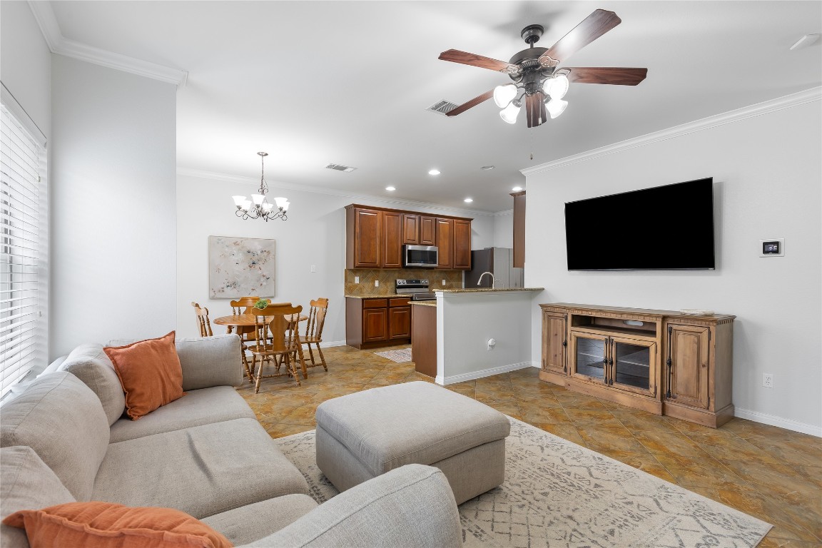 11237 Lost Maples Trail Austin, TX 78748 - Photo 7 of 35 a living room with furniture and a flat screen tv