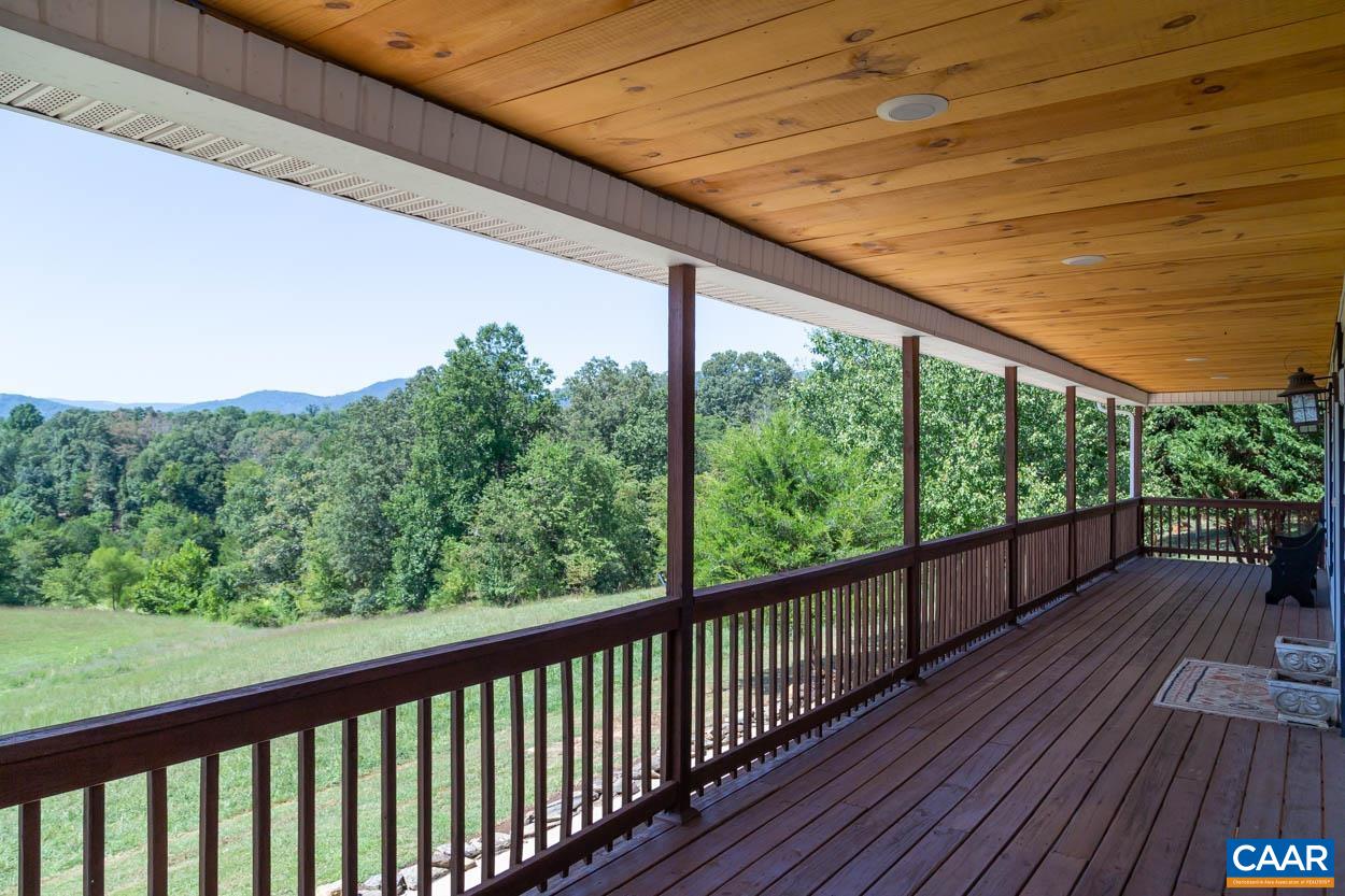 5289 Free Union Road Free Union, VA 22940 - Photo 12 of 63 a view of a balcony with wooden floor
