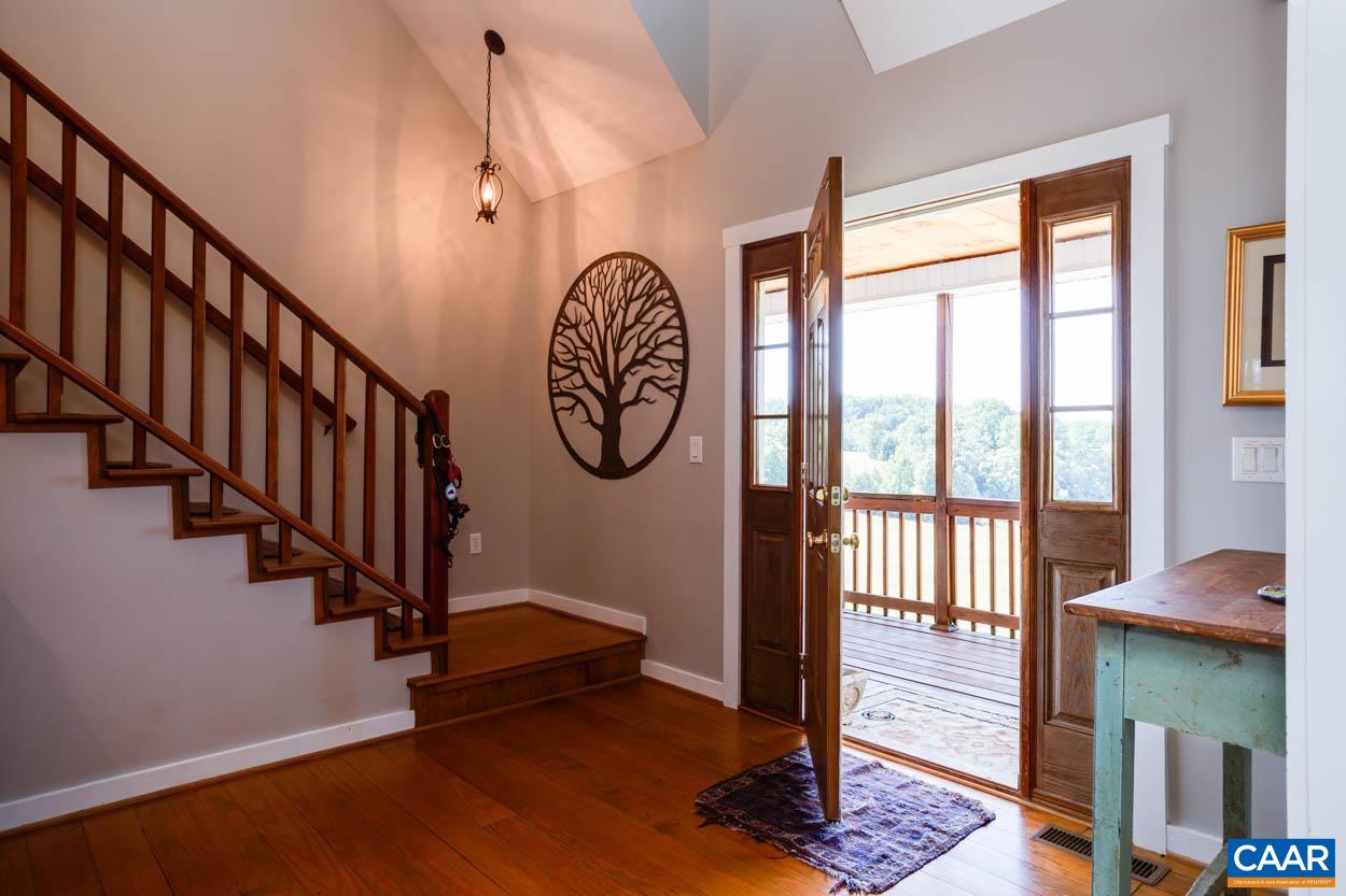 5289 Free Union Road Free Union, VA 22940 - Photo 14 of 63 a view of a hallway with wooden floor and windows