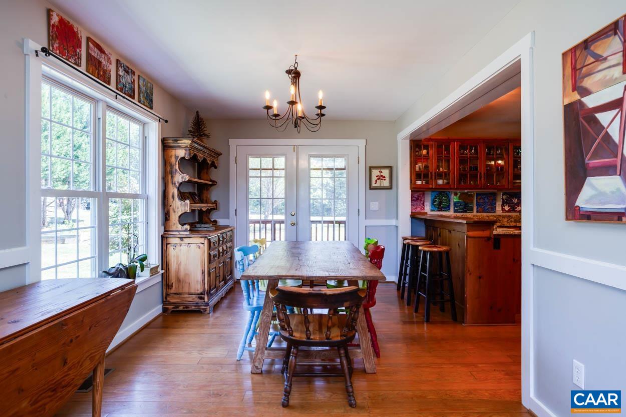 5289 Free Union Road Free Union, VA 22940 - Photo 21 of 63 a view of a dining room with furniture window and wooden floor
