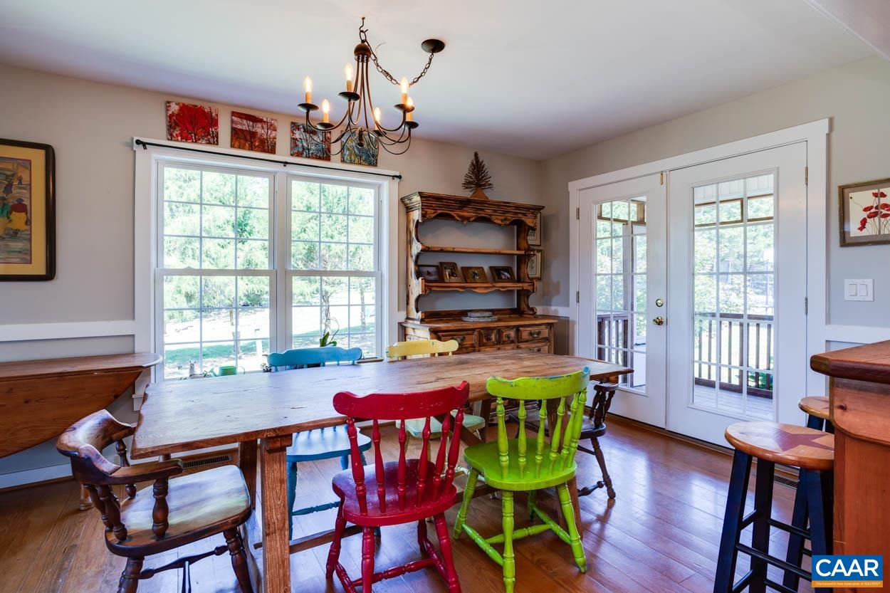 5289 Free Union Road Free Union, VA 22940 - Photo 22 of 63 a view of a dining room with furniture window and wooden floor