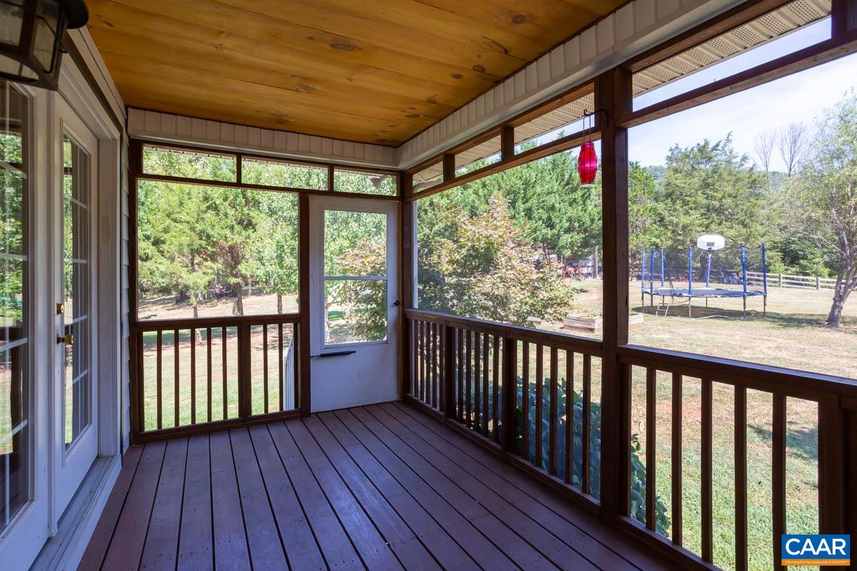 5289 Free Union Road Free Union, VA 22940 - Photo 29 of 63 a view of a porch with wooden floor