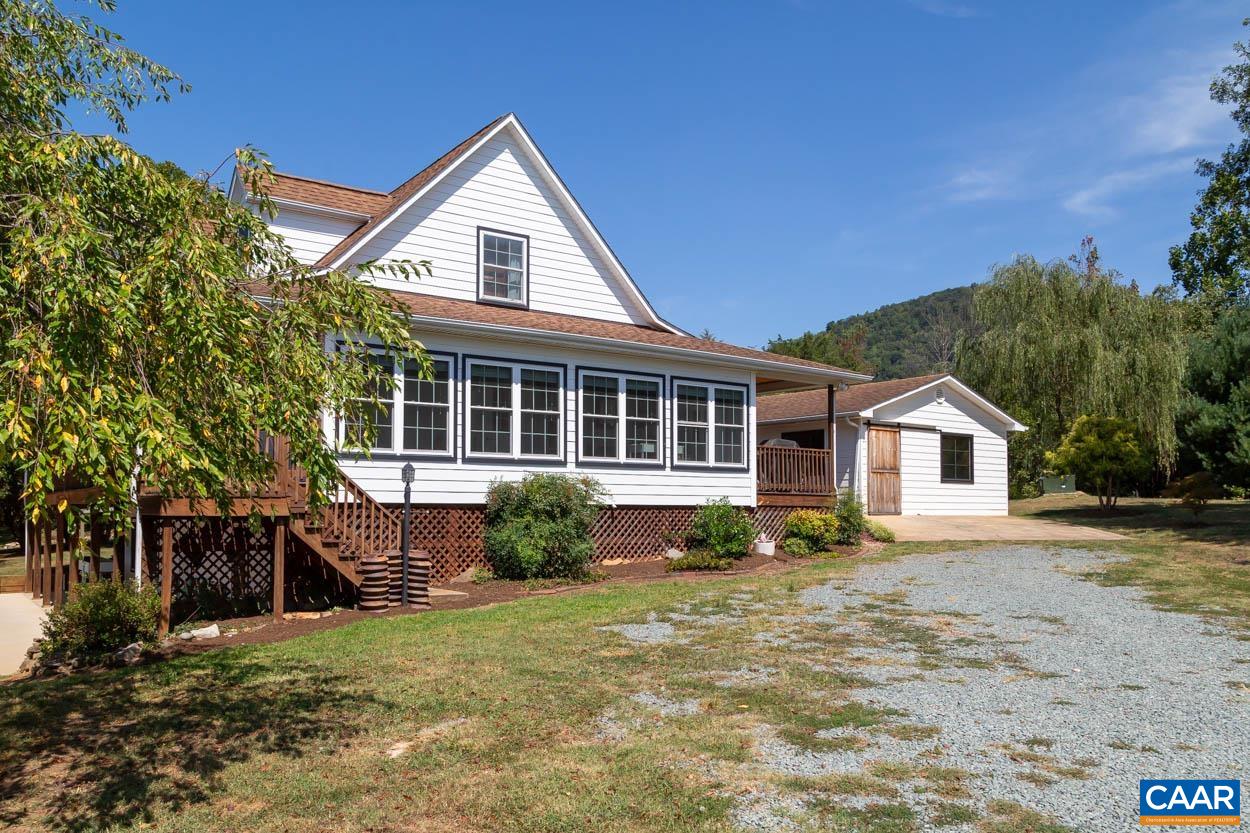 5289 Free Union Road Free Union, VA 22940 - Photo 63 of 63 a front view of a house with a yard