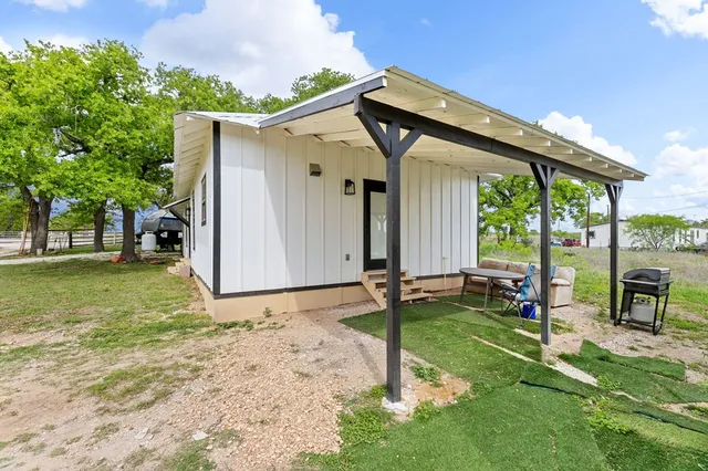 a front view of house with yard