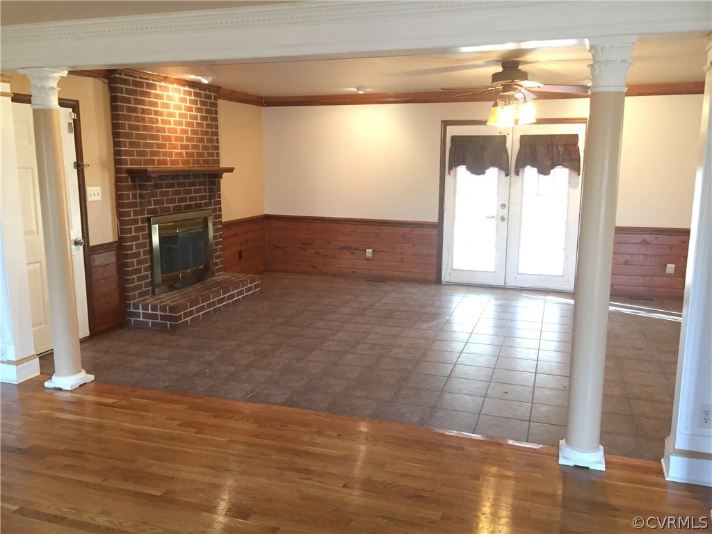 3807 Doe Run Road Hopewell, VA 23860 - Photo 8 of 29 a view of empty room with wooden floor and fireplace