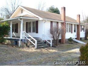 678 Old Clyde Road Clyde, NC 28721 - Photo 1 of 8 a front view of a house with garden