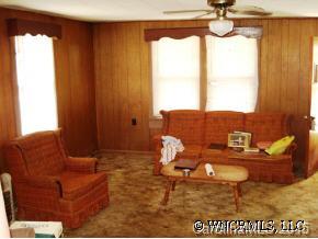 678 Old Clyde Road Clyde, NC 28721 - Photo 5 of 8 a living room with furniture and a large window