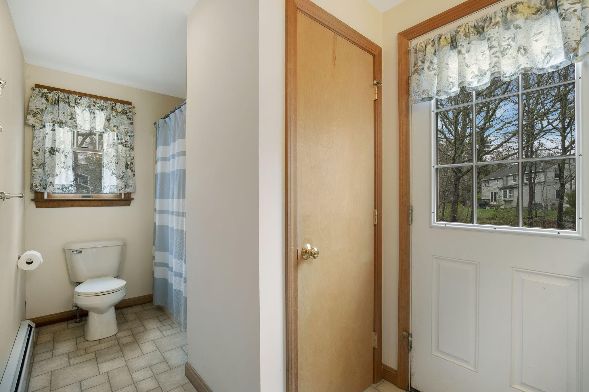 65 Whitney Road Eastham, MA 02642 - Photo 25 of 41 a bathroom with a toilet sink and shower