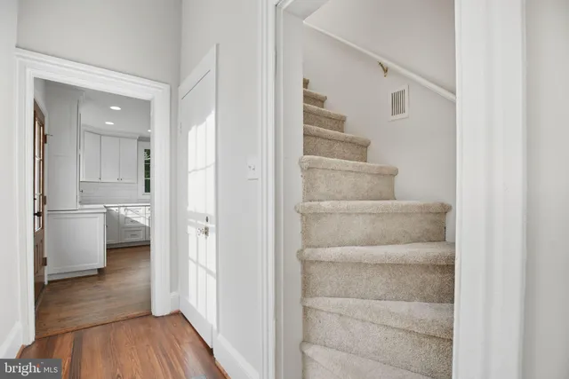 a bathroom with a toilet sink and shower