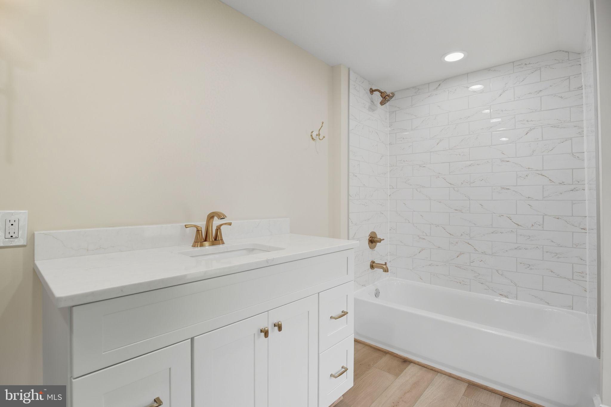 5965 Acorn Spring Place La Plata, MD 20646 - Photo 40 of 54 a bathroom with a sink a toilet and shower