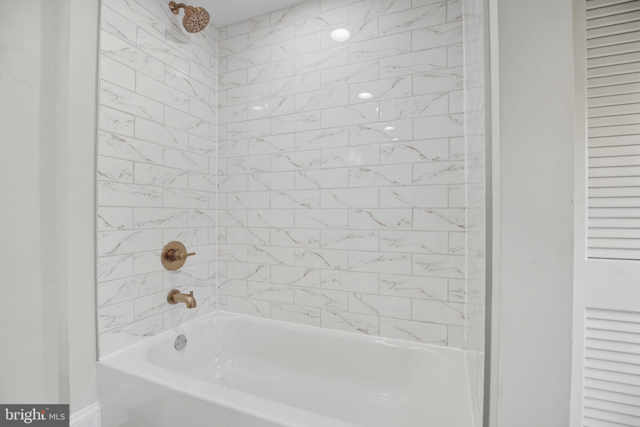 5965 Acorn Spring Place La Plata, MD 20646 - Photo 43 of 54 a bathroom with a bathtub