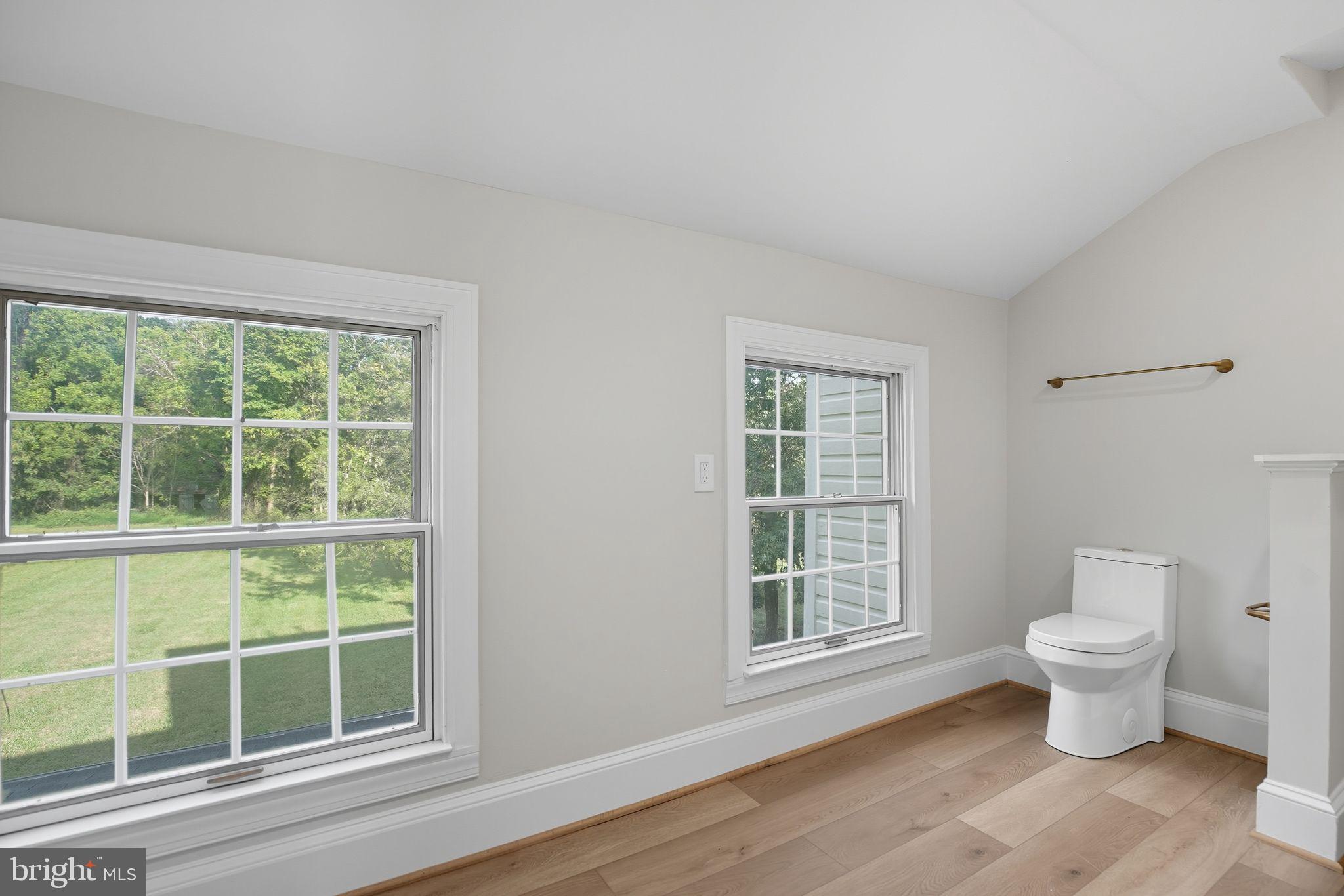 5965 Acorn Spring Place La Plata, MD 20646 - Photo 44 of 54 a view of a room with wooden floor and windows