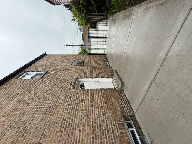 a close view of light fixtures and a mirror in a bathroom