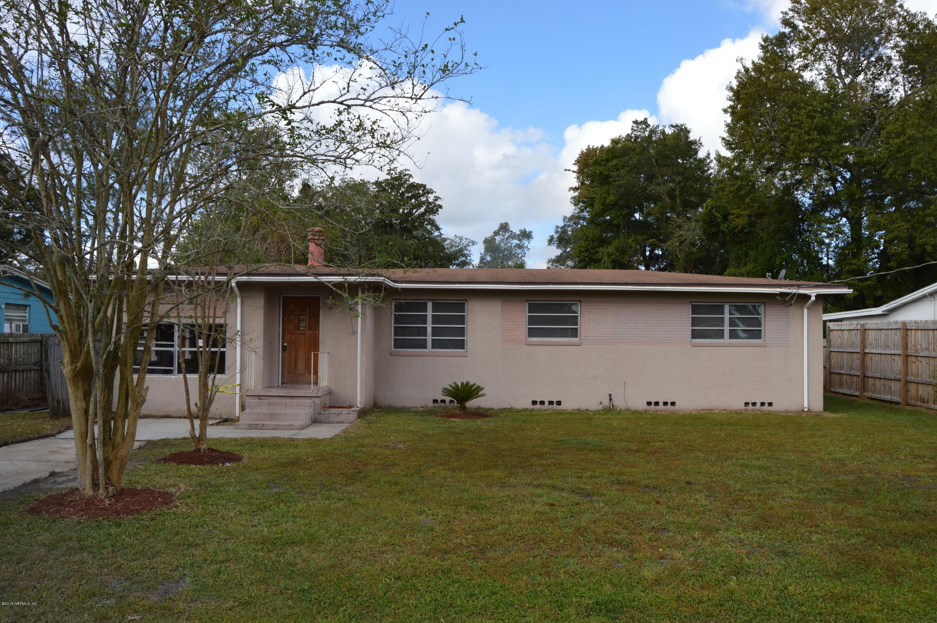 2236 Dean Road Jacksonville, FL 32216 - Photo 1 of 21 front view of house with a yard